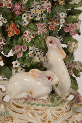 Lot 534 - A pair of Derby candlesticks