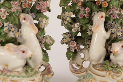 Lot 534 - A pair of Derby candlesticks