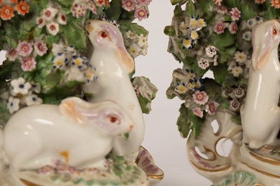 Lot 534 - A pair of Derby candlesticks