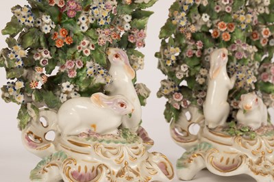 Lot 534 - A pair of Derby candlesticks