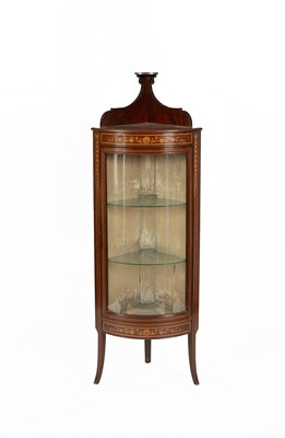 Lot 610 - An Edwardian inlaid corner display cabinet