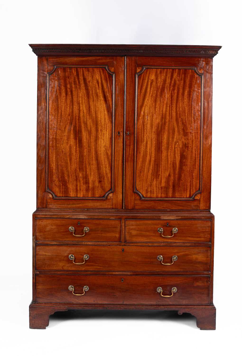 Lot 563 - A George III mahogany linen press