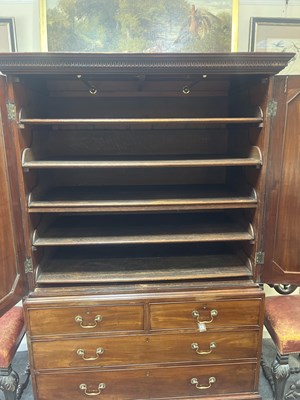 Lot 563 - A George III mahogany linen press