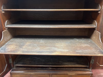Lot 563 - A George III mahogany linen press