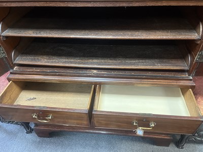 Lot 563 - A George III mahogany linen press