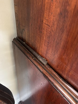 Lot 563 - A George III mahogany linen press