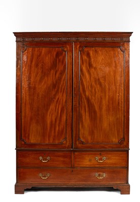 Lot 564 - A late George III mahogany wardrobe