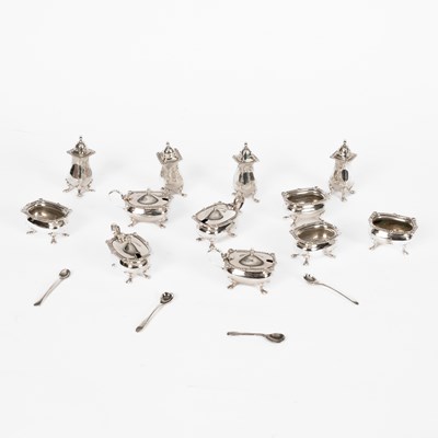 Lot 83 - A twelve-piece silver plated cruet set