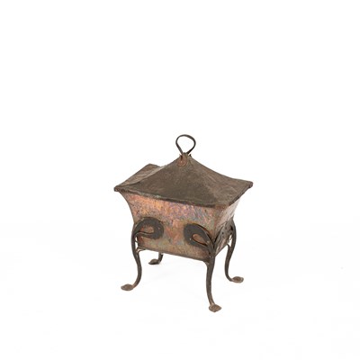 Lot 430 - An Arts & Crafts copper and wrought iron lidded coal scuttle