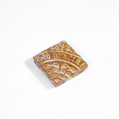 Lot 90 - An English terracotta encaustic floor tile, 15th Century