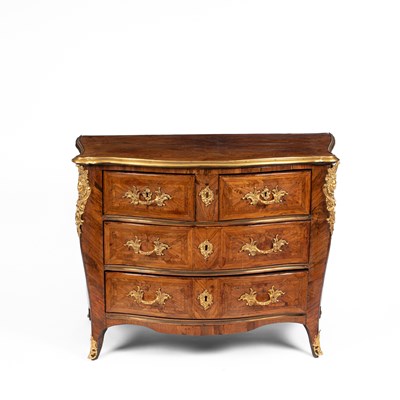 Lot 669 - A Louis XV Kingwood parquetry serpentine commode