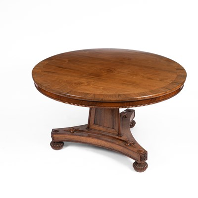 Lot 673 - A Regency rosewood and crossbanded centre table