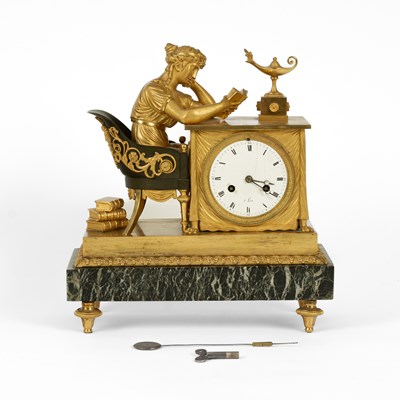 Lot 700 - An Empire eight-day ormolu clock