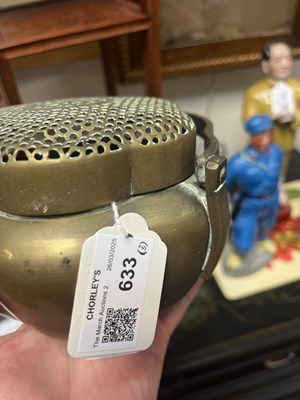 Lot 633 - A Chinese brass brazier or handwarmer