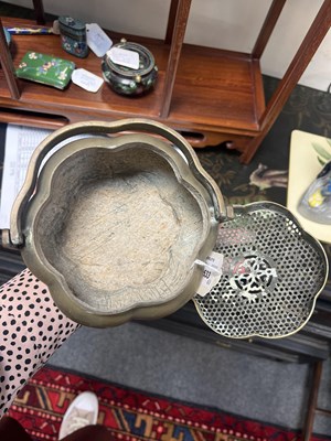 Lot 633 - A Chinese brass brazier or handwarmer