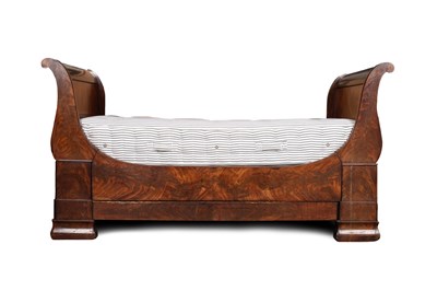 Lot 641 - A French Empire mahogany lit-en-bateau