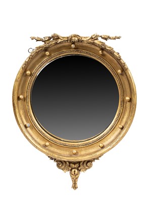 Lot 657 - A Regency convex mirror
