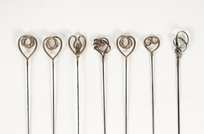 Lot 25 - An Edwardian Art Nouveau gold plated and bass hatpin