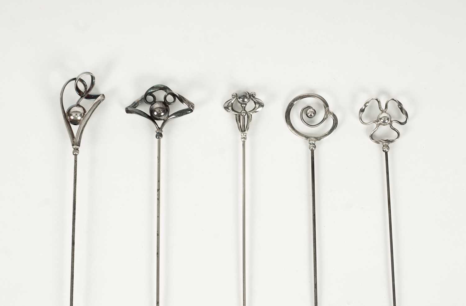 Lot 32 - Five Edwardian Charles Horner silver hatpins