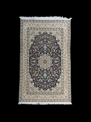Lot 715 - A Nain rug