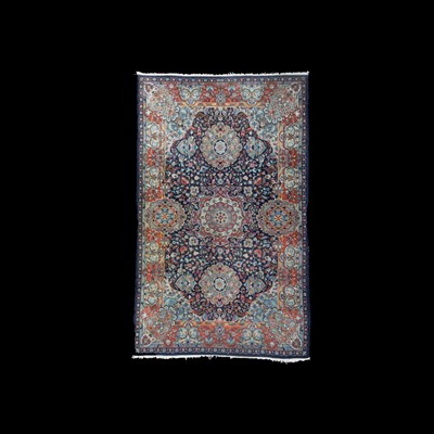 Lot 717 - A Kirman rug
