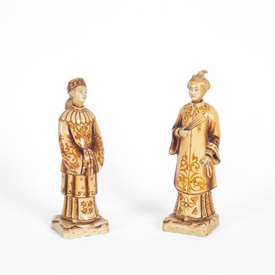 Lot 354 - Pair of Chinese yellow/cream glazed ceramic figures