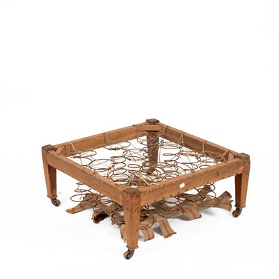 Lot 691 - A Howard & Sons mahogany footstool frame