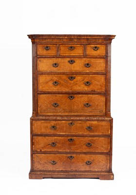 Lot 581 - A George II walnut and featherbanded secretaire chest on chest