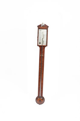Lot 701 - A mahogany stick barometer
