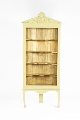 Lot 551 - A French style green painted corner cabinet on stand