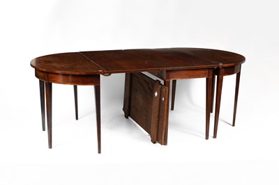 Lot 588 - A late Georgian mahogany extending dining table