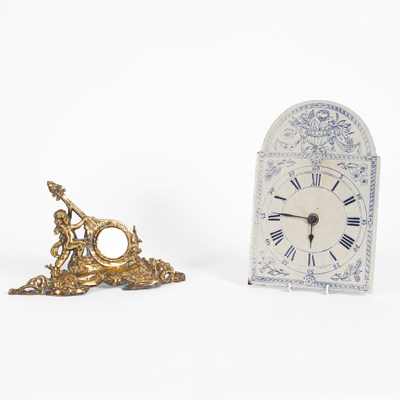 Lot 708 - A brass cased mantel clock