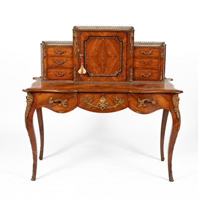 Lot 194 - A Victorian walnut and gilt-metal mounted writing desk