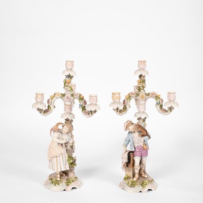 Lot 478 - A pair of German porcelain figural candlesticks