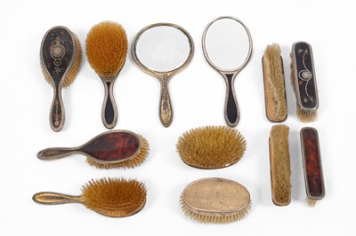 Lot 8 - An Edwardian silver and tortoiseshell dressing set