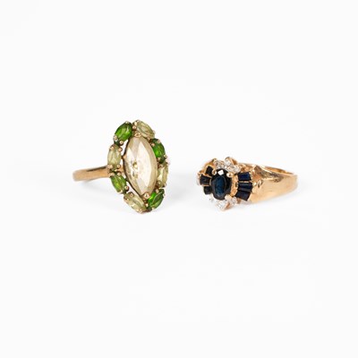 Lot 3 - Two yellow metal gem set rings