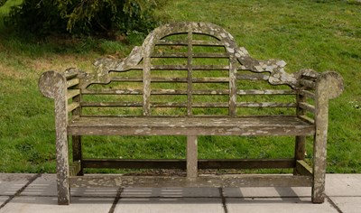 Lot 524 - A Lutyens type wooden garden bench