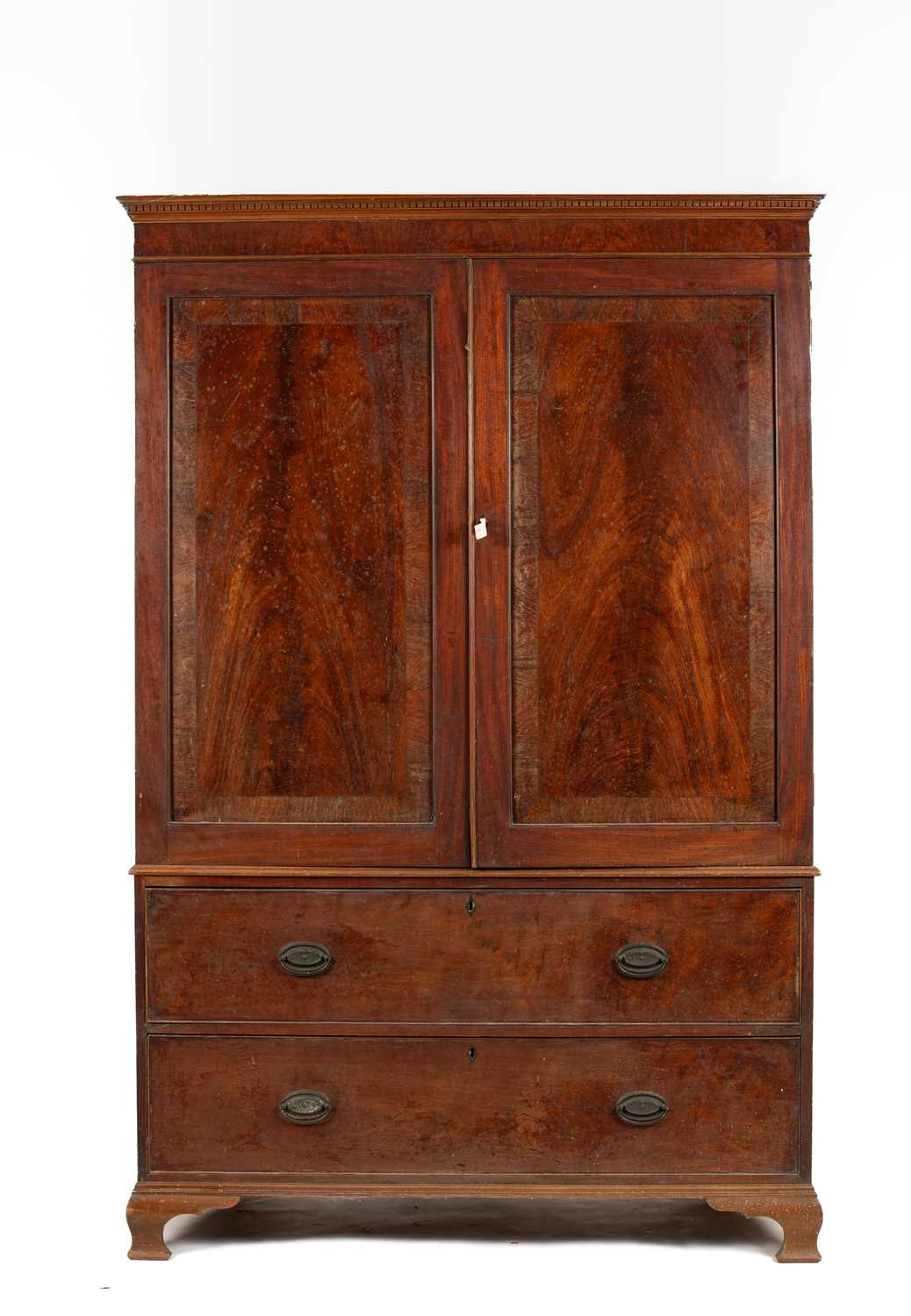 Lot 577 - A George III mahogany linen press