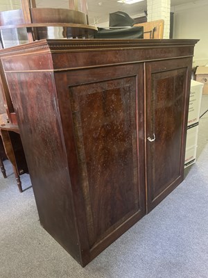 Lot 577 - A George III mahogany linen press