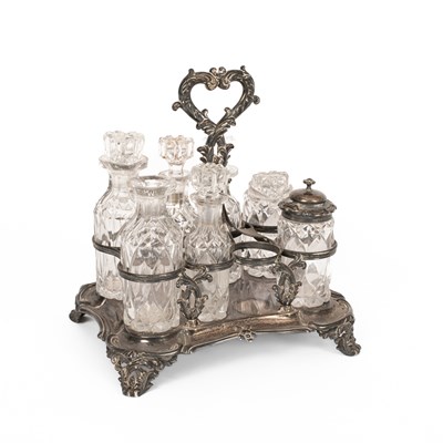 Lot 41 - A William IV eight bottle silver cruet stand