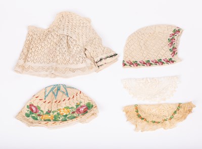 Lot 831 - A baby's crochet and beadwork cardigan