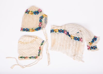 Lot 838 - A European crocheted baby's cardigan