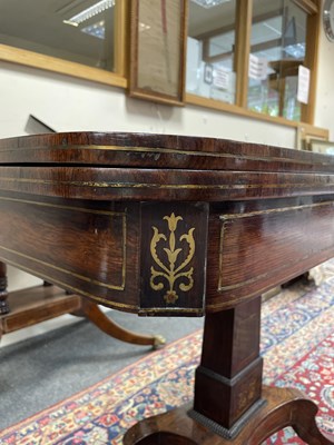 Lot 589 - A Regency rosewood and brass inlaid card table