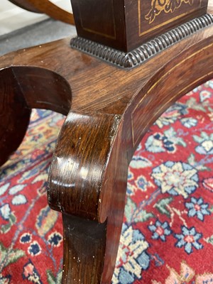 Lot 589 - A Regency rosewood and brass inlaid card table