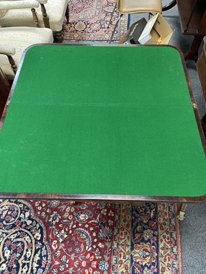 Lot 589 - A Regency rosewood and brass inlaid card table