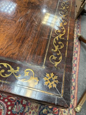 Lot 589 - A Regency rosewood and brass inlaid card table