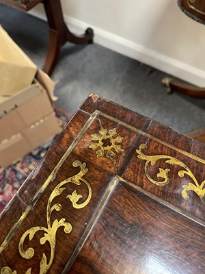 Lot 589 - A Regency rosewood and brass inlaid card table