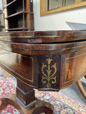 Lot 589 - A Regency rosewood and brass inlaid card table