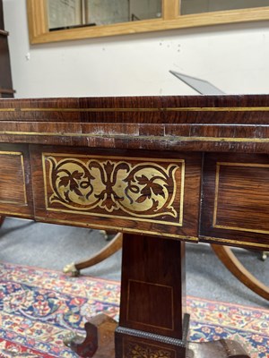 Lot 589 - A Regency rosewood and brass inlaid card table