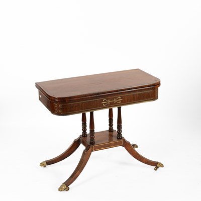 Lot 590 - A Regency rosewood and brass inlaid card table